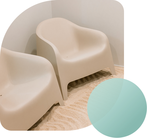 Molded relaxation chairs in the Breathe Salt Rooms salt cave