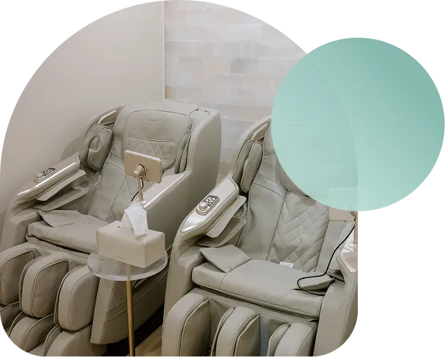 A pair of reclined salt therapy chairs draped with soft blankets.